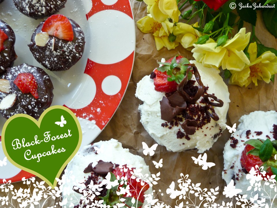 Vegan Chocolate cupcakes filled with Strawberry syrup and topped with Whipped strawberry cream and fresh strawberries - Heavenly!